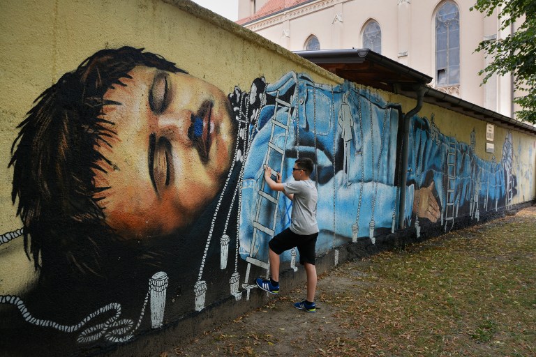 Colorful street art murals can be seen around Zagreb.