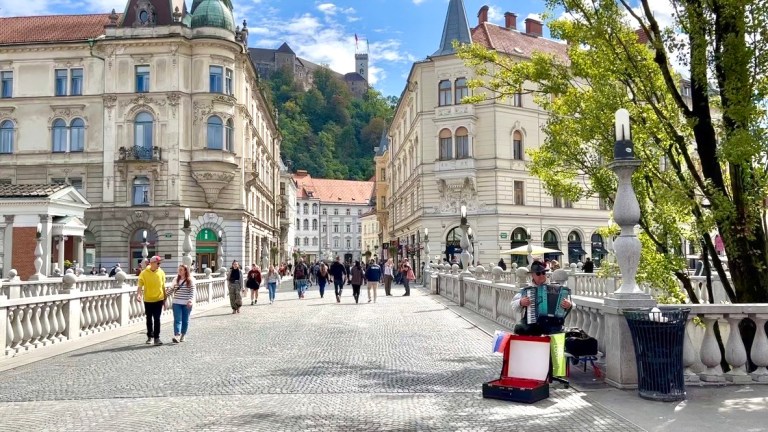 The Triple Bridge in Slovenia with Ljubljana Castle in the background.